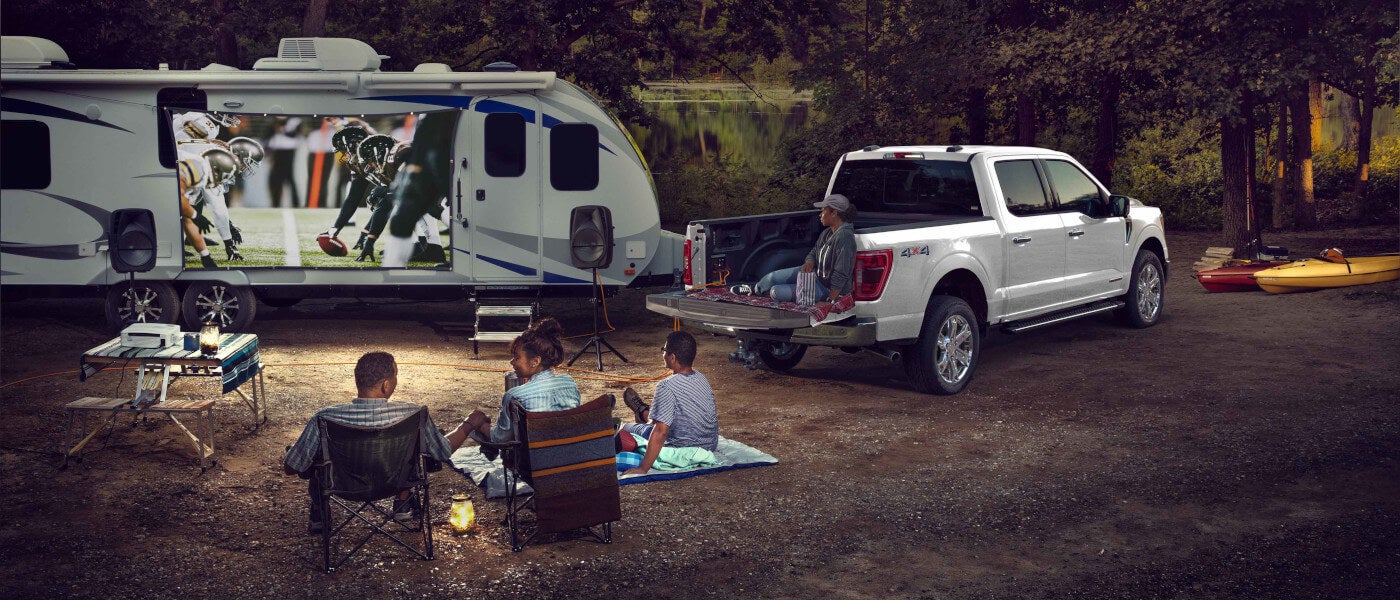 2026Ford-F150-ExteriorWithRVandFamilyWatchingFootball