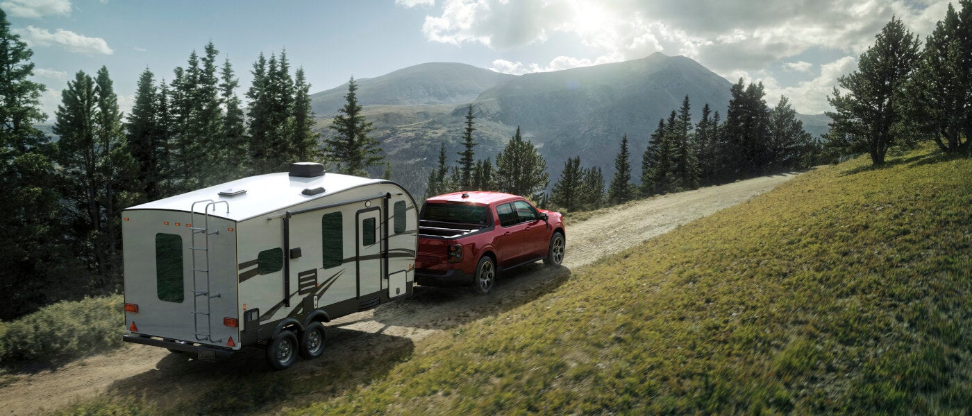 2026-Ford-Maverick-Exterior-Towing-Trailer-In-Mountains