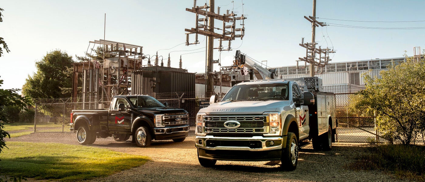 2026Ford-SuperDuty-ExteriorTwoParkedByPowerPlant